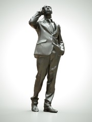 Plastic figure of a black man in a suit talking on the phone. 3d rendering.