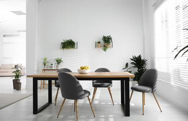 Stylish room interior with green plants. Home decoration