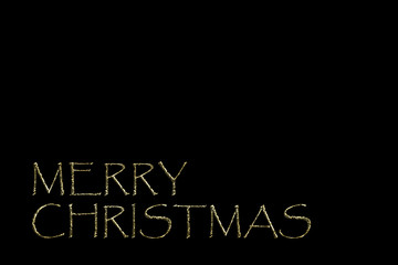 Fototapeta na wymiar text merry Christmas gold letters on black background