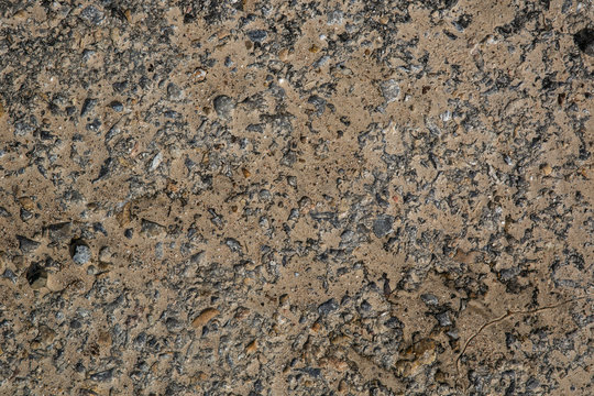 Textura de un muro de piedra gris y marrón 