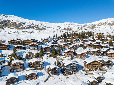 Aerial image of  the Swiss alps chalet village Bettmeralp in Canton Vaud. It is one of the famous winter sport resort near the Unesco heritage Aletch Glacier.