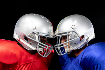 Two American football players head to head