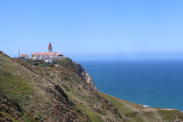 Sintra lighthouse on the rocky shore