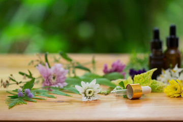 Obraz na płótnie Canvas Glass aromatherapy essential oil bottles
