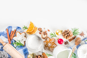 Christmas baking background. Christmas sweet cooking ingredients on white table. Ingredient for cooking christmas pastry, cookies and cakes, Flatlay on white table, top view with copy space