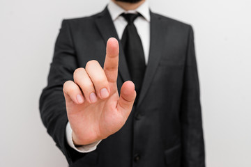 Male human with beard wear formal working suit clothes raising one hand up