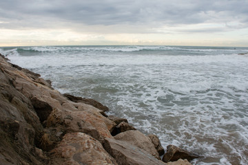 sea and rocks on foreground