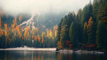 Foggy lake 4k footage in Dolomites Italy