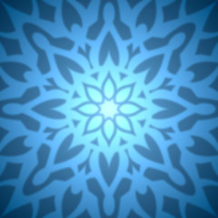Abstract blue snowflake with blurred effect.