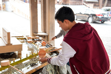 A young man happy tourist Japanese Temple