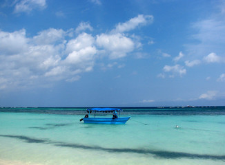 motorboat in caribbean, crystal clear water