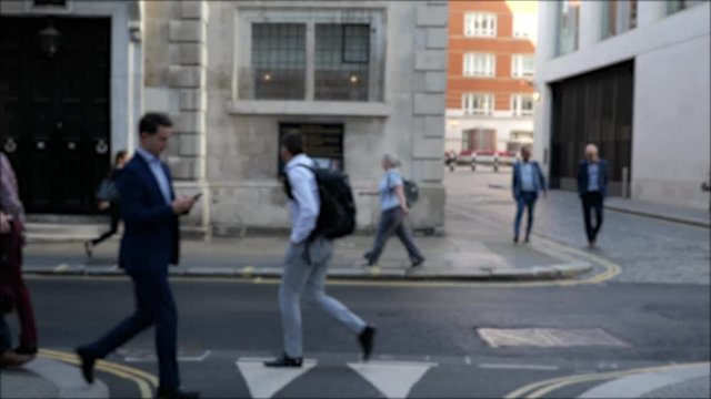 Side shot of people walking down a london street