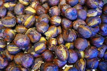 Roasted chestnuts in a pan for sale in the street in Kyoto