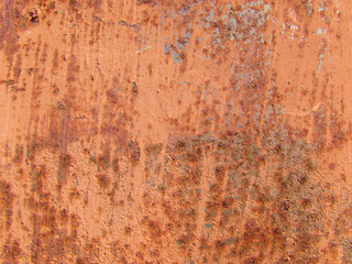 Metallic, rusty surface. A metal, rust-coated wall.