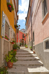 Sepino, Italy, 08/14/2017. A small street among the colorful houses of a village in the Molise region