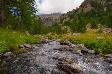 French Alps at an altitude of 2800 meters, Mountain peaks and untouched nature, clear lakes