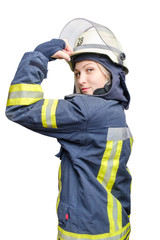Attractive blonde girl-firefighter in helmet showing fist as woman power symbol.