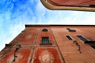 Old colorful Episcopal Palace facade in Murcia