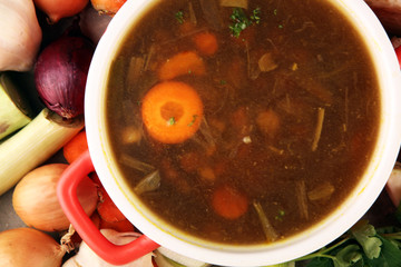 Meat stew with beef, potato, carrot, onion, spices, green peas. Slow cooked meat stew, bowl. Hot autumn or winter dish. Closeup. Comfort food.