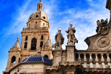 Obraz premium Tower bell, sculptures and carved stone details of the Cathedral of Murcia