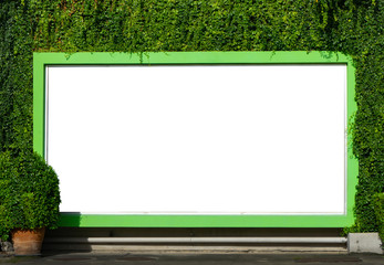 White billboard on spring summer green leaves background