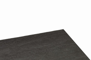 Perspective view of empty black stone or granite table top. Isolated on white background including clipping path.