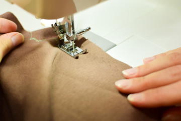 stitching fabric on a sewing machine