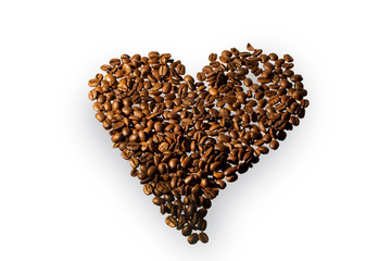 Heart made of coffee beans on a white .background