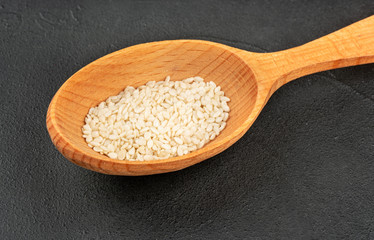 Sesame seeds in spoon