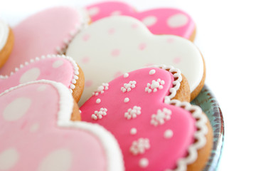 Set of pink heart shaped cookies with patterns, handmade products