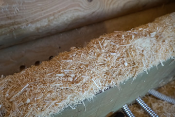 Chips and sawdust during the construction of house. Slivers of w