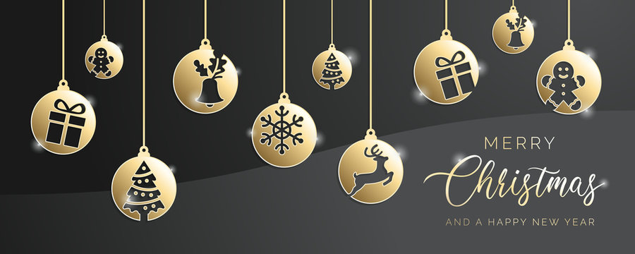 Golden christmas tree balls decoration on grey background