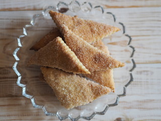 shortbread biscuits with sugar on a wooden rustic table
