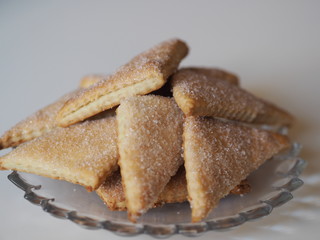 shortbread biscuits with sugar on a wooden rustic table