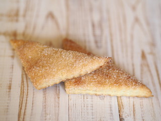 shortbread biscuits with sugar on a wooden rustic table