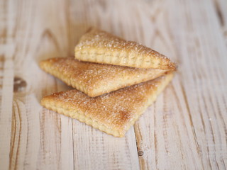 shortbread biscuits with sugar on a wooden rustic table