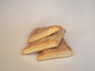 shortbread biscuits with sugar on a wooden rustic table