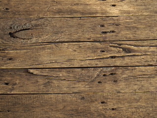 Naklejka premium wooden decorative ancient gray from old planks brown background
