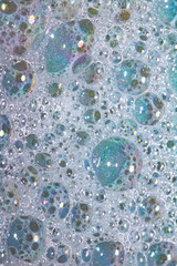 Close Up of Bath Water Bubbles Foam For Background In Blue