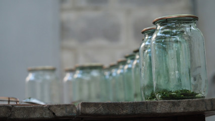 Photo of finished cans for preservation at home. Composition of empty cans for preservation at home background