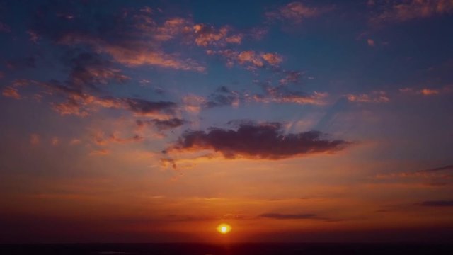 Time lapse of Moving Cloud in sunset sky with aerial view