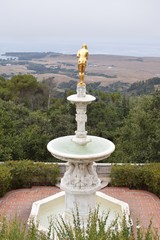 fountain in park gold statue
