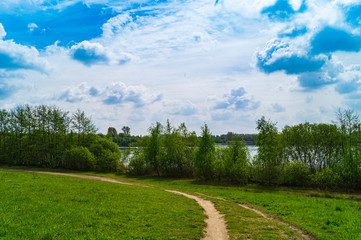 summer landscape with road and clouds
