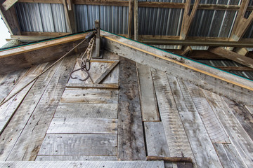 Exterior of barn and hayloft with hay carrier. 