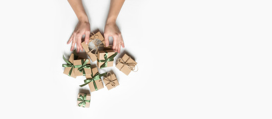 Christmas zero waste, eco friendly packaging. Festive Christmas composition packs gifts in kraft...