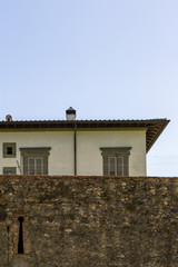 House and wall in Italy
