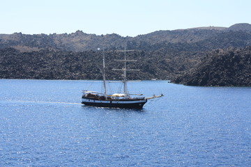 Ship close to the island os Santorini, Greece