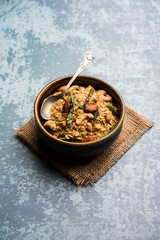 Oats Chivda / Chiwda is a healthy indian recipe with added chilli, peanuts, cashew, almond and...