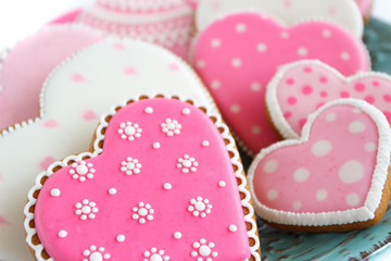 Set of pink heart shaped cookies with patterns, handmade products