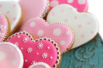 Set of pink heart shaped cookies with patterns, handmade products